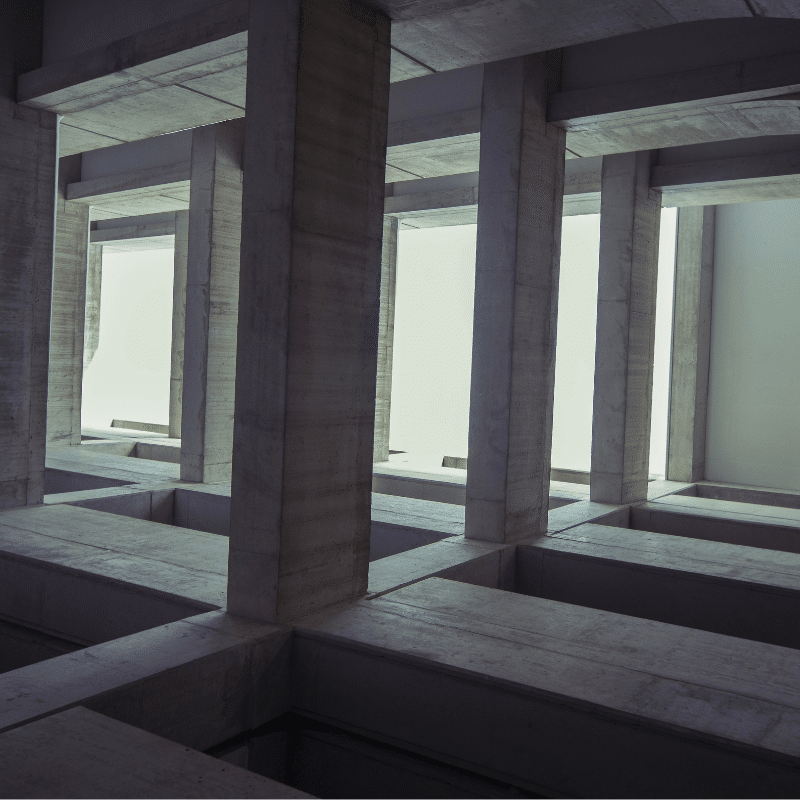 Concrete dye application showing intense, vibrant red color on interior floor