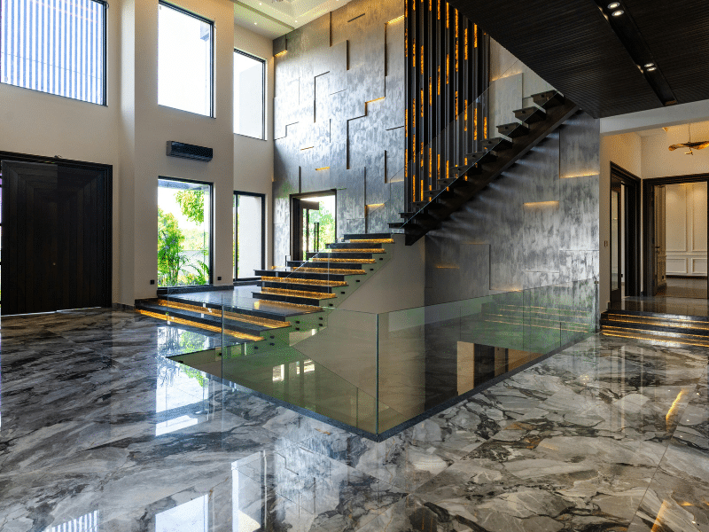 Epoxy floor coating being applied to a garage floor in South Amboy showing glossy, durable finish