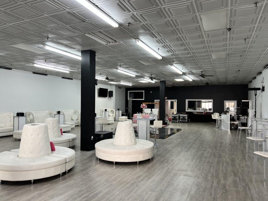 MR Paint team conducting final inspection of commercial interior painting project